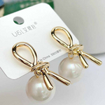 Load image into Gallery viewer, Knot Pearl Earrings Clip On Pearl Earrings Big Silver Grey Earrings
